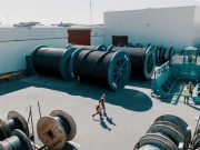 Un gigant global își transferă producția în România. Este lider mondial în cabluri pentru energie și telecomunicații!